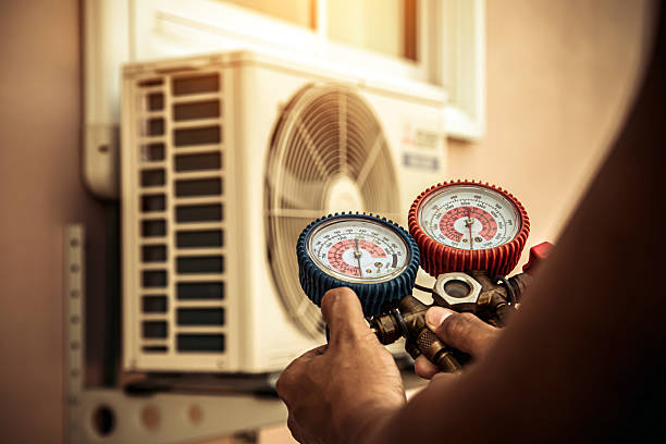 Professional Air Conditioning Service technician working in Media, PA